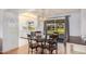 Dining area with round table and chairs, adjacent to kitchen at 9920 W Shasta Dr, Sun City, AZ 85351