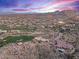 Luxury estate nestled on a hillside overlooking a golf course at 10473 E Greythorn Dr, Scottsdale, AZ 85262
