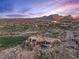 Aerial view of luxury home with pool and golf course views at 10473 E Greythorn Dr, Scottsdale, AZ 85262