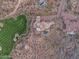 Bird's eye view of large estate, highlighting its unique design at 10473 E Greythorn Dr, Scottsdale, AZ 85262