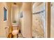 Bathroom with toilet and a walk-in shower at 10473 E Greythorn Dr, Scottsdale, AZ 85262
