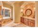 Spa-like bathroom with soaking tub and tiled walls at 10473 E Greythorn Dr, Scottsdale, AZ 85262