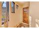 Inviting entryway with natural light and wood door at 10473 E Greythorn Dr, Scottsdale, AZ 85262