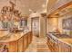 Island kitchen with granite countertops and high end appliances at 10473 E Greythorn Dr, Scottsdale, AZ 85262