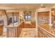 Gourmet kitchen with granite countertops and custom wood cabinetry at 10473 E Greythorn Dr, Scottsdale, AZ 85262