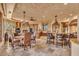 Large kitchen with island, breakfast nook, stone fireplace and high-end finishes at 10473 E Greythorn Dr, Scottsdale, AZ 85262