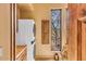 Convenient laundry room with washer, dryer, and window at 10473 E Greythorn Dr, Scottsdale, AZ 85262