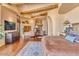 Spacious main bedroom with a large bed and sitting area at 10473 E Greythorn Dr, Scottsdale, AZ 85262