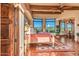 Spacious main bedroom with terracotta floors, large windows, and mountain views at 10473 E Greythorn Dr, Scottsdale, AZ 85262