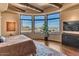 Spacious main bedroom with wood floors and stunning views at 10473 E Greythorn Dr, Scottsdale, AZ 85262