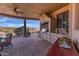 Outdoor kitchen with grill, sink, and ample counter space at 10473 E Greythorn Dr, Scottsdale, AZ 85262