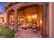 Relaxing patio with fire pit and seating area, offering stunning views at 10473 E Greythorn Dr, Scottsdale, AZ 85262