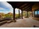 Covered patio with flagstone flooring and mountain views at 10473 E Greythorn Dr, Scottsdale, AZ 85262