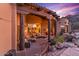 Spacious patio with a fire pit and seating area at 10473 E Greythorn Dr, Scottsdale, AZ 85262
