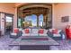 Outdoor patio with fire pit and comfortable seating at 10473 E Greythorn Dr, Scottsdale, AZ 85262