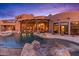 Luxury pool and spa with southwestern architecture at 10473 E Greythorn Dr, Scottsdale, AZ 85262