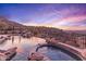 Stunning infinity pool and spa with mountain views at 10473 E Greythorn Dr, Scottsdale, AZ 85262