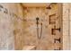 Spacious shower with tiled walls and built-in seat at 10473 E Greythorn Dr, Scottsdale, AZ 85262