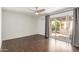 Bedroom with sliding closet doors and backyard view at 10662 N 33Rd Pl, Phoenix, AZ 85028