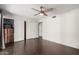 Bright bedroom with double door closet and ceiling fan at 10662 N 33Rd Pl, Phoenix, AZ 85028