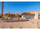 Well-maintained home with tile roof, mature landscaping, and a two-car garage at 10662 N 33Rd Pl, Phoenix, AZ 85028