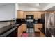 Galley kitchen with granite countertops at 10662 N 33Rd Pl, Phoenix, AZ 85028