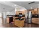 Kitchen island and stainless steel appliances at 10662 N 33Rd Pl, Phoenix, AZ 85028