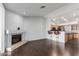 Living room with fireplace and kitchen views at 10662 N 33Rd Pl, Phoenix, AZ 85028