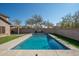 Escape to your own backyard retreat, complete with a sparkling pool and grassy area at 10789 W Yearling Rd, Peoria, AZ 85383