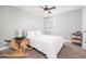 Bedroom with carpeted floor, a bed, and a ceiling fan at 10789 W Yearling Rd, Peoria, AZ 85383