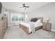 Large main bedroom with a king-size bed and lots of natural light at 10789 W Yearling Rd, Peoria, AZ 85383