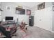 Home office with a large desk and a safe at 10789 W Yearling Rd, Peoria, AZ 85383