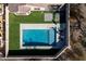 Aerial view of a rectangular pool in backyard with surrounding patio at 10789 W Yearling Rd, Peoria, AZ 85383