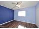 Bedroom with wood flooring and ceiling fan at 10828 N Biltmore Dr # 115, Phoenix, AZ 85029
