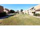Expansive community lawn, providing a green space for relaxation at 10828 N Biltmore Dr # 115, Phoenix, AZ 85029
