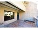 Private patio with tiled flooring and access to the unit at 10828 N Biltmore Dr # 115, Phoenix, AZ 85029