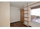 Small storage room with built-in shelves and tile flooring at 10828 N Biltmore Dr # 115, Phoenix, AZ 85029