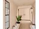 Bright entryway with double doors and modern tile flooring at 10961 E Gary Rd, Scottsdale, AZ 85259