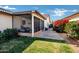 Picture of covered patio that overlooks a well-maintained grassy backyard at 12087 S Paiute St, Phoenix, AZ 85044