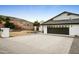 Contemporary home with a large driveway and mountain views at 13026 N 12Th Ave, Phoenix, AZ 85029