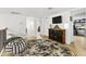 Upstairs hallway with a view of bedrooms and play area at 13026 N 12Th Ave, Phoenix, AZ 85029