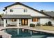 Back exterior showcasing a clean design and pool access at 13026 N 12Th Ave, Phoenix, AZ 85029