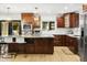 Gourmet kitchen featuring stainless steel appliances and an island at 13026 N 12Th Ave, Phoenix, AZ 85029