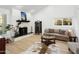 Bright living room with fireplace and comfortable seating at 13026 N 12Th Ave, Phoenix, AZ 85029