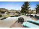 Inviting backyard oasis with a sparkling pool and fire pit at 13026 N 12Th Ave, Phoenix, AZ 85029