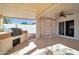 Outdoor kitchen area with built-in grill at 14949 W Robson Cir, Goodyear, AZ 85395
