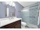 Updated bathroom with patterned tile shower and vanity at 14949 W Robson Cir, Goodyear, AZ 85395