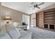 Living room featuring built-in shelving and comfortable seating at 14949 W Robson Cir, Goodyear, AZ 85395