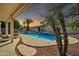 Spacious backyard with a refreshing pool at 14949 W Robson Cir, Goodyear, AZ 85395