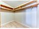 Large walk-in closet with shelving and hanging rod at 17200 W Bell Rd # 1581, Surprise, AZ 85374